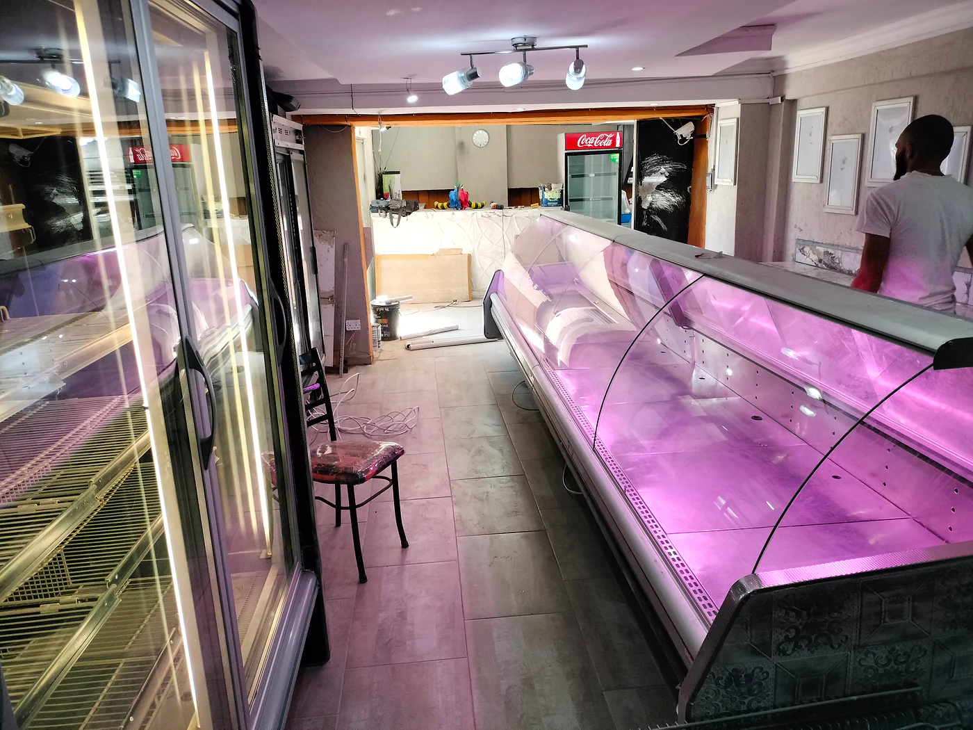 Refrigerated display counter and wall chillers in a retail shop